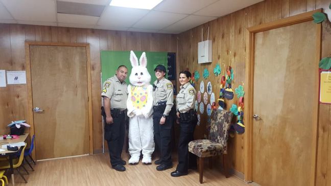 Easter bunny with cops.jpg